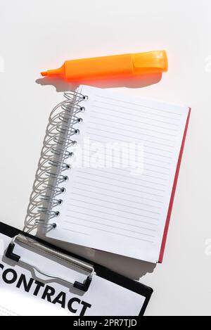 Notebook With Important Message With Marker And Clipboard. Notepad With Crutial Informations On Desk With Colored Pen. Critical Announcement Written On Paper. Stock Photo