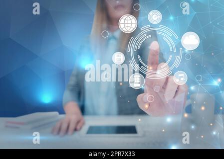 Lady in suit pointing finger upwards symbolizing successful teamwork accomplishing newest project plans. Woman directing hand up representing combined effort management. Stock Photo