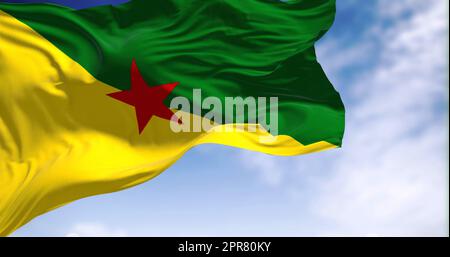 Flag of French Guiana waving in the wind on a clear day Stock Photo