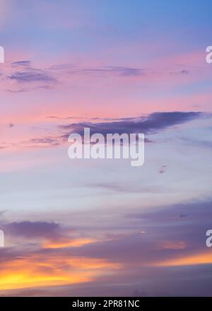 Beautiful clouds at sunset, the colors of pastel sky nature background. Stock Photo