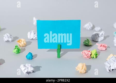 Important Message Presented On Piece Of Paper Clipped With Clip With Paperwraps All Aroud. Crutial Information Written On Note. Critical Announcement Displayed On Memo. Stock Photo
