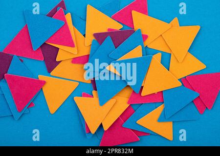 Abstract colorful geometrical composition background with random paper triangles Stock Photo