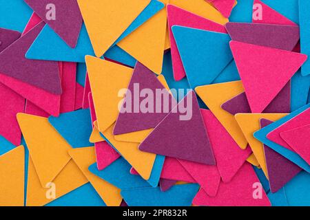 Abstract colorful geometrical composition background with random paper triangles Stock Photo