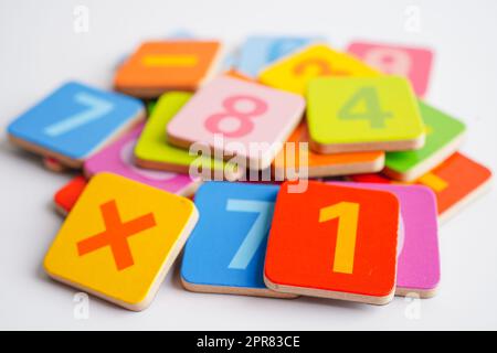 Number wood block cubes for learning Mathematic, education math concept. Stock Photo