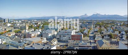 Scenic landscape of the city of Bodo in Nordland, Norway with lush surroundings, panoramic mountain and clear sky background with copyspace. Peaceful coastal suburb with breathtaking views Stock Photo
