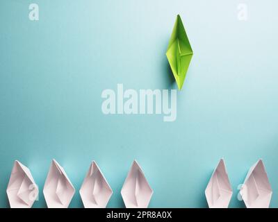 New ideas, creativity and various innovative solutions or leadership, ecology concept with paper boats Stock Photo