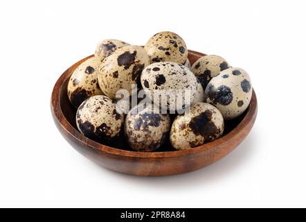 Quail eggs placed on a white background Stock Photo