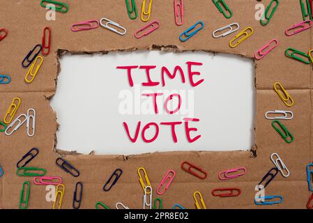 Text showing inspiration Time To Vote. Business approach Election ahead choose between some candidates to govern Important Ideas Written Under Ripped Cardboard With Paperclips Around. Stock Photo