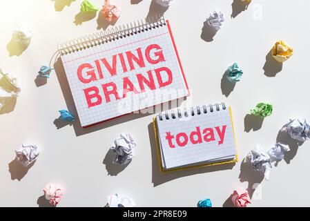 Writing displaying text Giving Brand. Word for The process of giving a Name to a company products or services Notebooks With Important Messages Surrounded By Paper Wraps. Stock Photo