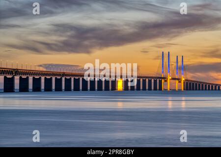 The Oresund bridge between Denmark and Sweden after sunset Stock Photo