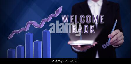 Hand writing sign Welcome Back. Business idea Warm Greetings Arrived Repeat Gladly Accepted Pleased Businessman in suit holding open palm symbolizing successful teamwork. Stock Photo