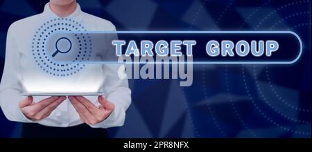 Text sign showing Target Group. Business overview Particular showing that an advertisement intended to reach to Woman With Tablet Presenting Digital Search Bar With New Strategies. Stock Photo