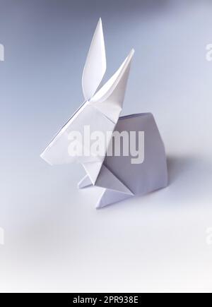 Paper rabbit origami isolated on a white background Stock Photo