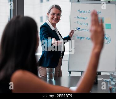 Yes have you got an idea for me. a mature businesswoman giving a presentation at work. Stock Photo