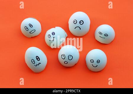 Eggshells with painted faces with different emotions Stock Photo