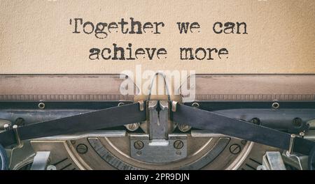 Vintage typewriter - Together we can achieve more Stock Photo