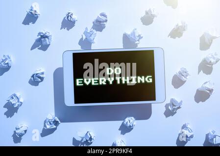 Inspiration showing sign Do Everything. Business showcase Jack of All Trades Self Esteem Ego Pride No Limits Paper Wraps Placed Around Tablet With Important Informations. Stock Photo
