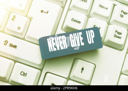 Text sign showing Never Give Up. Word Written on Keep trying until you succeed follow your dreams goals -48992 Stock Photo