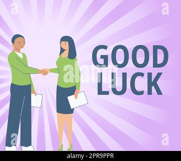 Inspiration showing sign Good Luck, Word Written on A positive fortune or a happy outcome that a person can have Colleagues Sitting On Desk With Lapto Stock Photo