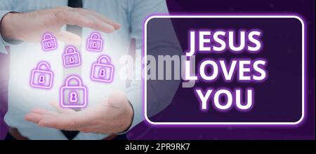 Hand writing sign Jesus Loves You. Business overview Believe in the Lord To have faith religious person Man With Digital Padlocks In Hands Showing Data And Cyber Security. Stock Photo