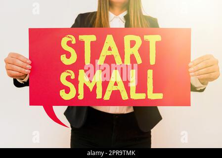 Text showing inspiration Start Small. Conceptual photo Small medium enterprises start up Business entrepreneurship Businesswoman Holding Speech Bubble With Important Messages. Stock Photo