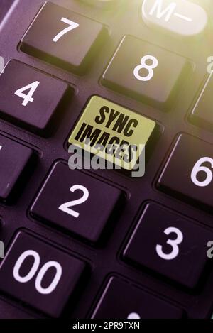 Sign displaying Sync Images. Conceptual photo Making photos identical ...