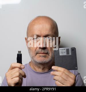 a floppy disk and a USB key Stock Photo