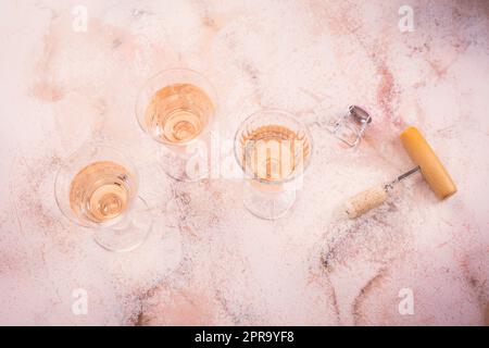 Three glasses of rose wine at wine tasting Stock Photo