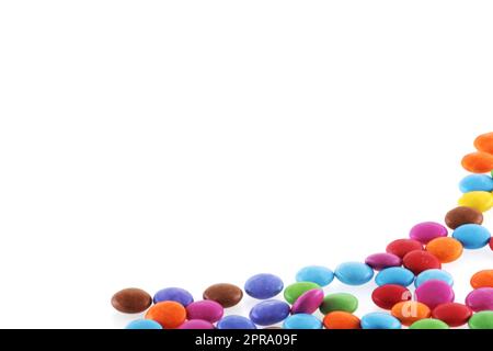 Bottom right border of multi coloured halloween candy sweets Stock Photo
