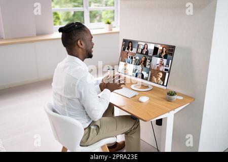 Man Clapping In Online Video Conference Business Stock Photo