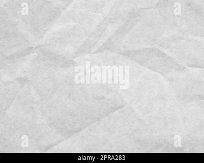 White crumpled greaseproof paper texture background. Stock Photo