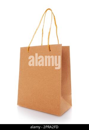 Empty cardboard craft bag on a white background. Stock Photo