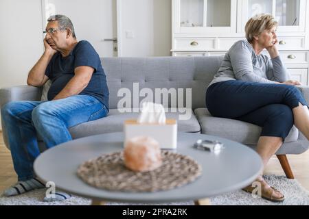 Upset senior couple at home having an argument Stock Photo
