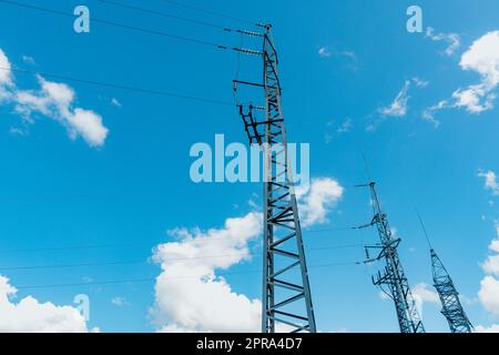 Three high voltage towers Stock Photo