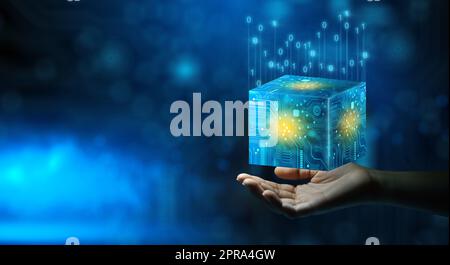 Businessman hand holding Cube computing technology. Cloud data and Internet Security. Stock Photo
