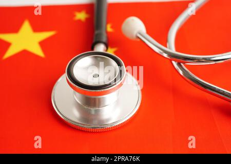 Black stethoscope on China flag background, Business and finance concept. Stock Photo