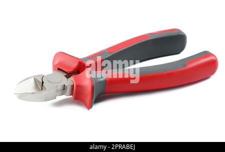 Side cutters with a plastic red-black handle on a white isolated background Stock Photo
