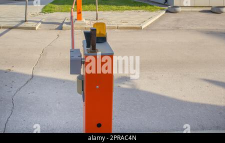 Automatic barrier for the security system at the entrance to the protected area, close-up Stock Photo
