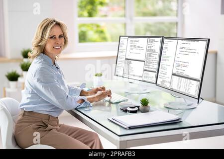 Programmer Woman Coding Stock Photo