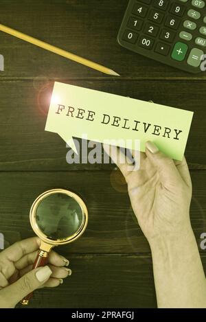 Handwriting text Free Delivery. Business idea Shipping Package Cargo Courier Distribution Center Fragile Hands Of Woman With Thought Bubble Paper And Stationery Over Wood. Stock Photo