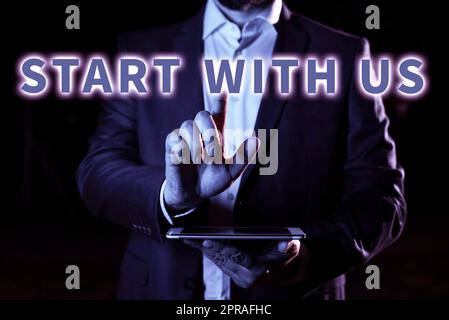 Text sign showing Start With Us. Word for Get started on our company Invitation to join a teamwork Businessman Pointing Important Infortmations With One Finger. Stock Photo