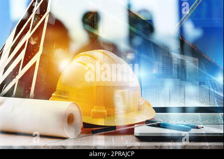 Laptop of a architect who plans a house Stock Photo
