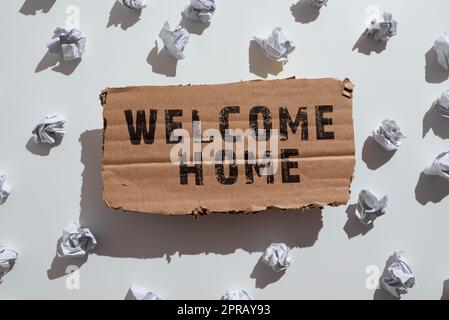 Welcome Doormat Placed In Front Of The Gray Front Door Of A Home Entrance  Stock Photo - Download Image Now - iStock