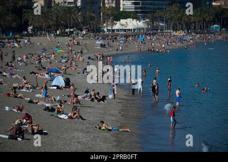 Malaga, Spain. 26th Apr, 2023. Bathers are seen sunbathing at 'La Malagueta' beach as they enjoy the good weather amid an unusual heat wave. Spain is experiencing an unusual episode of high temperatures in April, months before the beginning of summer. According to the Spanish State Meteorological Agency, temperatures of over 35 degrees will be reached in most of the country. (Photo by Jesus Merida/SOPA Images/Sipa USA) Credit: Sipa USA/Alamy Live News Stock Photo