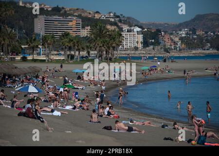 Malaga, Spain. 26th Apr, 2023. Bathers are seen sunbathing at 'La Malagueta' beach as they enjoy the good weather amid an unusual heat wave. Spain is experiencing an unusual episode of high temperatures in April, months before the beginning of summer. According to the Spanish State Meteorological Agency, temperatures of over 35 degrees will be reached in most of the country. (Photo by Jesus Merida/SOPA Images/Sipa USA) Credit: Sipa USA/Alamy Live News Stock Photo
