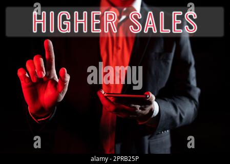 Conceptual display Higher Sales. Business overview The average sold products and services of a company has grown Man Holding Tablet And Pointing With One Finger On Important Message Stock Photo
