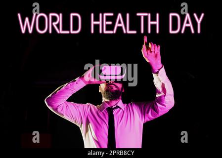 Handwriting text World Health Day. Business concept Global health awareness day celebrated every year Businessman Using Virtual Reality Simulator And Gesturing During Training. Stock Photo