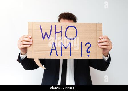 Handwriting text Who Am I. Business approach Introduce Identify yourself personality likes dislikes profile Businessman Holding Speech Bubble With Important Informations. Stock Photo