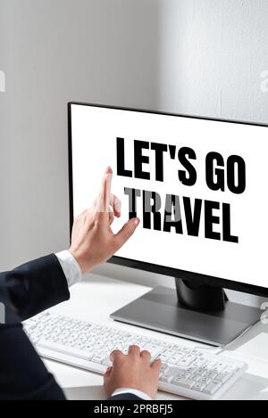 Writing displaying text Let S Is Go Travel. Word Written on Plan a trip visit new places countries cities adventure Woman Typing Updates On Lap Top And Pointing New Ideas With One Finger. Stock Photo