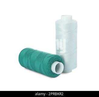 Different colorful sewing threads on white background Stock Photo